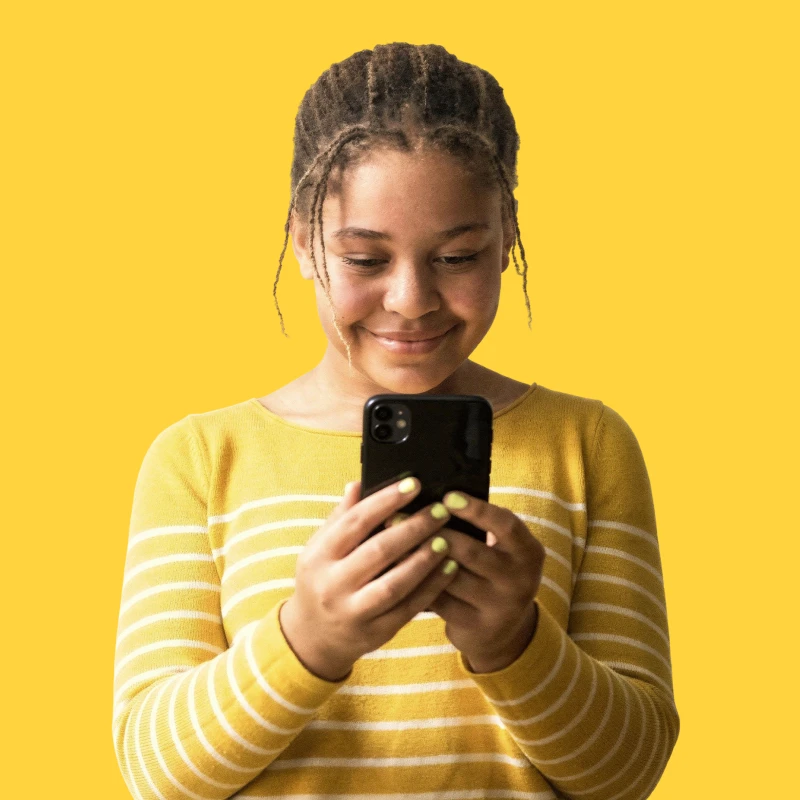 Child using iPhone with Bark app